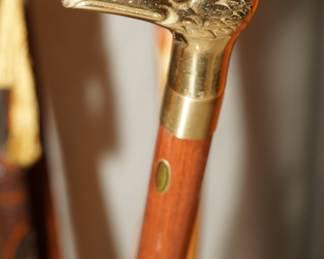 Brass eagle at the top of the cane