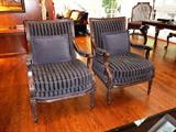 PAIR OF CARVED ARMCHAIRS BY BAKER