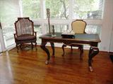 LEATHER TOP DESK WITH HOOVED FEET BY WILLIAM SWITZER
CARVED DESK ARMCHAIR BY SOUTHLAND FURNITURE