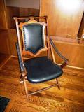 ANTIQUE FOLDING LEATHER CHAIR