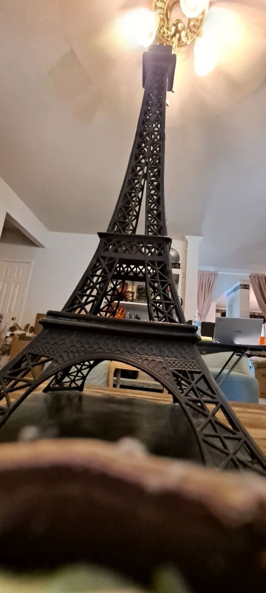 This is a beautiful replica of the Eiffel Tower it is part bronze very beautiful