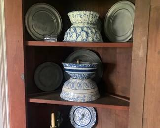 Top interior of corner cupboard.  Partial collection of early and contemporary pewter and antique spongeware and spatterware.