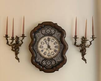 French Wall Clock Mid 19th C Boule surround and antiqued brass candle sconces in the Rococo taste, complete with vintage tapers 