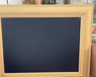 Blackboard slate in frame.