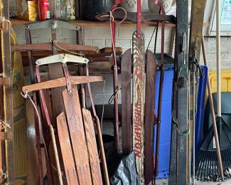 Vintage sleds and skis.