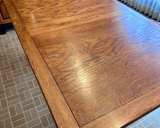 (Lot 1) $750  - Trestle Dining Table + 6 Chairs
Temple-Stuart Oak Hill Trestle Base Oak Dining Table, 2 leaves and 6 Wheel back Dining Chairs.  Dark Stain. Table 66”L 40”D up to 90”L with both leaves.  Chairs 18-1/2”w 16”d 39”h back, seat 17”h from floor.  