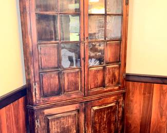 Stunning antique corner cabinet.