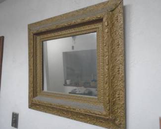 Beveled glass mirror with etched frame