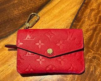 Louis Vuitton red empreinte embossed leather key pouch with tag