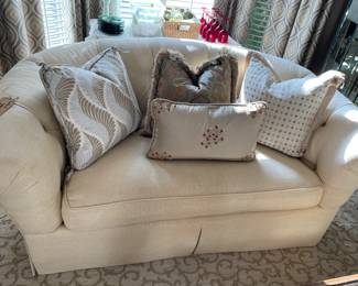Ivory Tufted Loveseat there are 2.  Both have custom pillows that are beautiful!