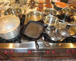 Cookware by Emeril Lagasse along with cast iron & others