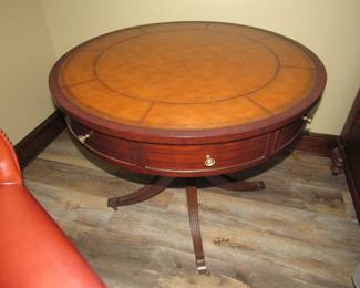 Leather top drum table with drawers