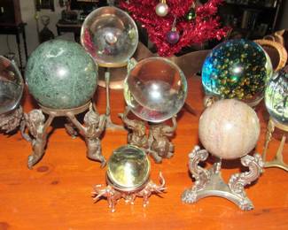 Collection of crystal & marble spheres on bronze or brass stands