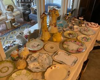 Vintage plates, teapots, and platters