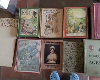 Antique and vintage books including an early Alice in Wonderland
