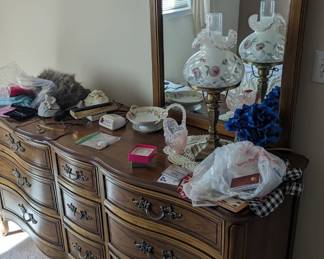 Large dresser and mirror w matching tall dresser and queen size bed. Sold separately 