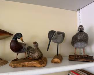 Carved bird decoys and figures