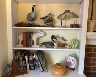 Books and carved wood bird figures and decoys