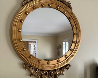 Round gold mirror