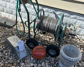 HavaHart trap, hose reel on wheels, Rawlings NCCA basketball & a cement urn