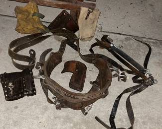 Leather tree climbing/telephone pole harness/belt saddle with accessories.