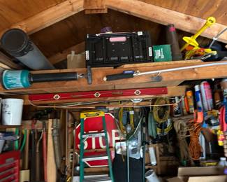 full shed of garage/yard tools & items including the STOP sign