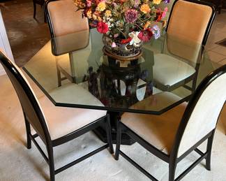 Glass top dining table with 6 white suede chairs