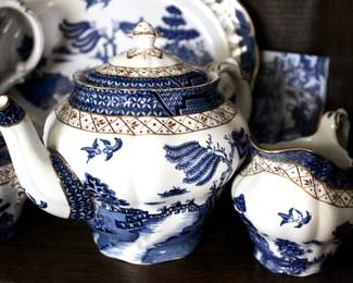 Lots of blue and white antique and vintage dishes, pottery, bake-ware, etc...