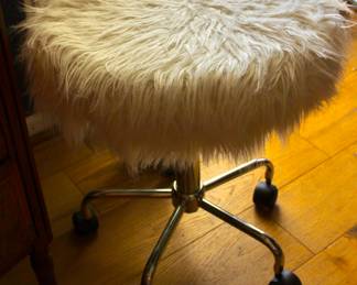Fuzzy white rolling office chair