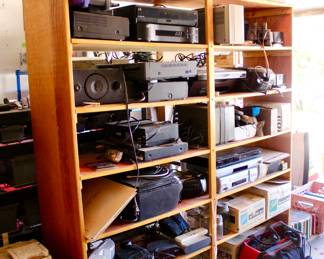 Large organizer shelving and electronics lot. Architectural moldings too.