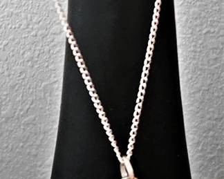 Handcrafted sterling silver and pink sapphire necklace. Great graduation gift.