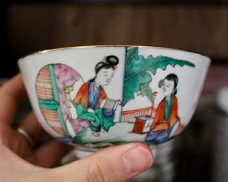 Tea cups with Asian artwork 