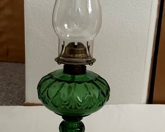 green glass oil lamp