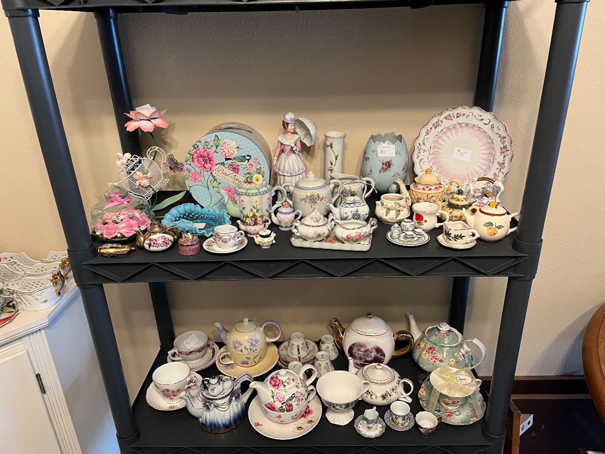 Large collection of teacups and teapots