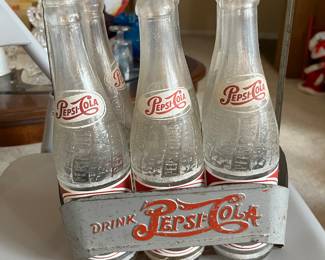 Six Vintage Sparkling Pepsi Bottles in a Metal Carrier