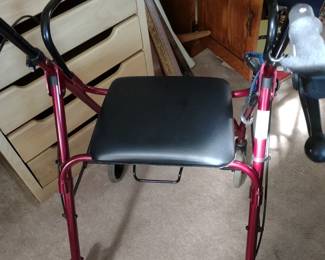 Wheeled walker with seat