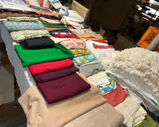 Fabric fabric and more fabric. Quilters Paradise. Any seems just for that matter - From burlap to silk