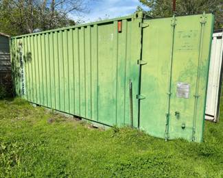 ONE OF THE TWO 8'x20' CONTAINERS AVAILABLE.  BOTH ARE WIRED WITH LIGHTING AND OUTLETS. WE CAN PROVIDE A NAME AND PHONE NUMBER OF SOMEONE ABLE TO TRANSPORT UNLESS YOU HAVE SOMEONE IN MIND TO HIRE.