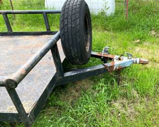 16' DUAL AXLE TRAILER WITH STEEL FLOOR.