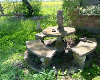 LARGE CONCRETE TABLE AND BENCHES.