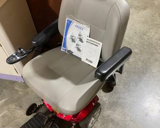 LIKE NEW JAZZY PRIDE POWERCHAIR WITH BRAND NEW BATTERIES.