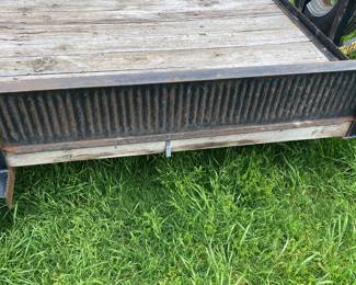 12 FOOT TRAILER WITH DUAL FRONT SIDE LOADING AND RAMPS.