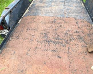 16' DUAL AXLE TRAILER WITH STEEL FLOOR.