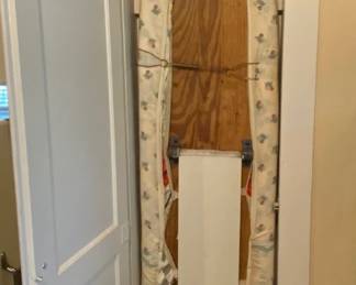 50’s DROP DOWN IRONING BOARD IN WALL CABINET. 