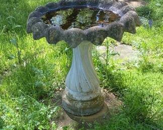 WE HAVE A FEW CONCRETE BIRD BATHS.