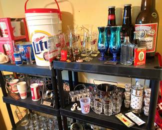 LOTS OF VINTAGE BEER AND LIQUOR COLLECTIBLES.