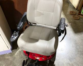 LIKE NEW JAZZY PRIDE POWERCHAIR WITH BRAND NEW BATTERIES.