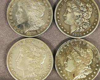 4 different Morgan Silver Dollars