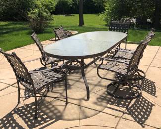 SunCoast Brand 6 Chairs (4 Swivel Chairs & 2 Straight Chairs) and a Oblong Glass Patio Table Set is $325