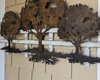 Oxidized copper oak tree fenced wall art.